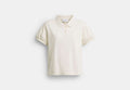 COACH® Women's Polo Recortado De Algodón Orgánico Con Inscripción Coach en Beige, Talla Mediano