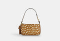 COACH® Women's Nolita 19 Con Estampado De Reno en Castaño | Cuir