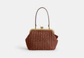 COACH® Women's Bolso Frame Kisslock 27 en Gris | Paille