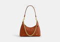 COACH® Women's Bolso De Hombro Juliet 25 Con Acolchado en Castaño | Cuir