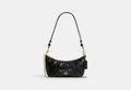 COACH® Women's Bolso De Hombro Caitlin Con Acolchado en Negro | Cuir