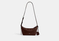 COACH® Unisex Bolso Mott Sling 22 en Castaño | Cuir