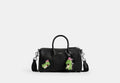 COACH® Unisex Bolso Compass 25 Con Darby Dino Y Charm Coach | Brain Dead en Negro | Cuir