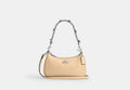 COACH® Women's Bolso De Hombro Teri Con Lazos en Beige | Cuir