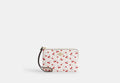 COACH® Women's Bolso Pouch Con Cremallera Lateral Con Estampado De Cerezas en Blanco | Cuir