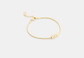 COACH® Women's Brazalete Con Rondelle De Perla Y Cubos en Blanco | Métal