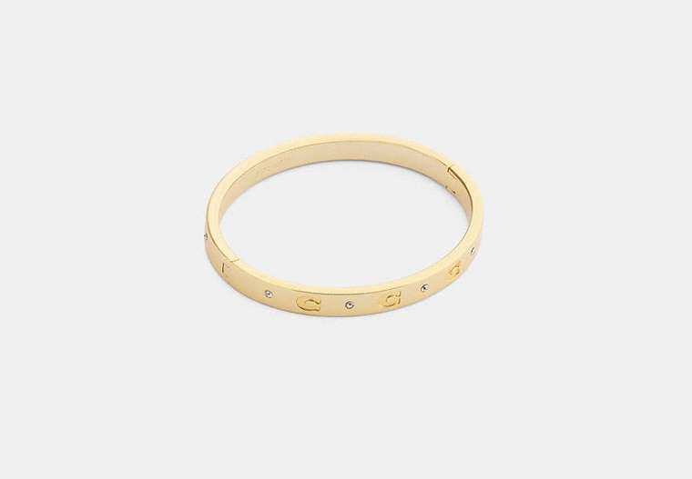 COACH® Women's Brazalete Con Bisagra Y C Repetida en Amarillo | Métal