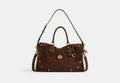 COACH® Women's Bolso Satchel Rhyder 38 en Castaño | Cuir