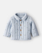 Chaqueta acolchada azul con lunares