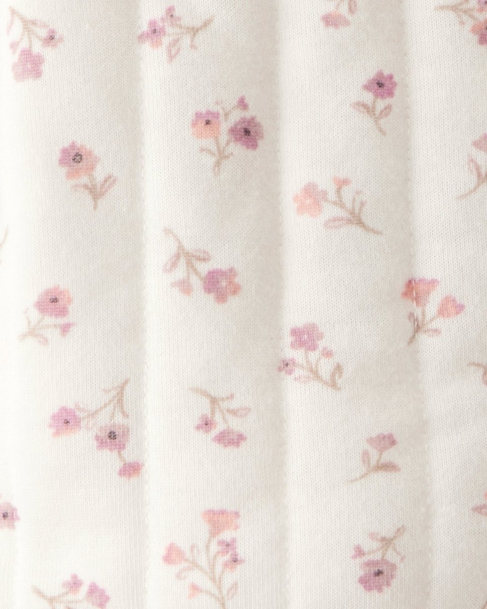 Chaqueta acolchada marfil con estampado floral