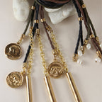 Collar largo moneda Auriga Monsul