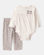 Conjunto 2 piezas con body de lazos y pantalón leopardo