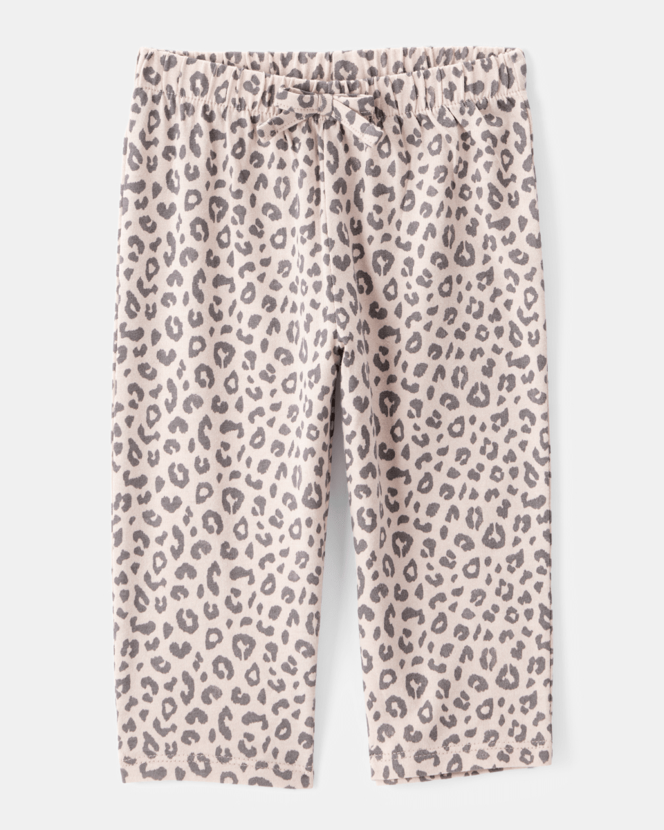 Conjunto 2 piezas con body de lazos y pantalón leopardo
