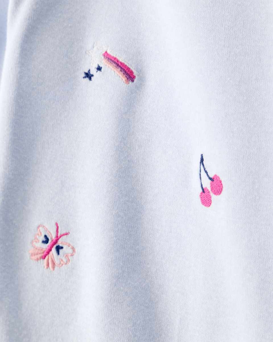 Conjunto dos piezas algodón con body de frutas de manga larga y pantalón azul