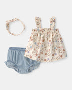 Conjunto tres piezas blusa y cubrepañal con lazo de lino y algodón, diseño floral