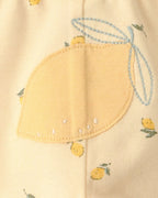 Conjunto tres piezas de algodón con dos bodies y pantalón, diseño limones