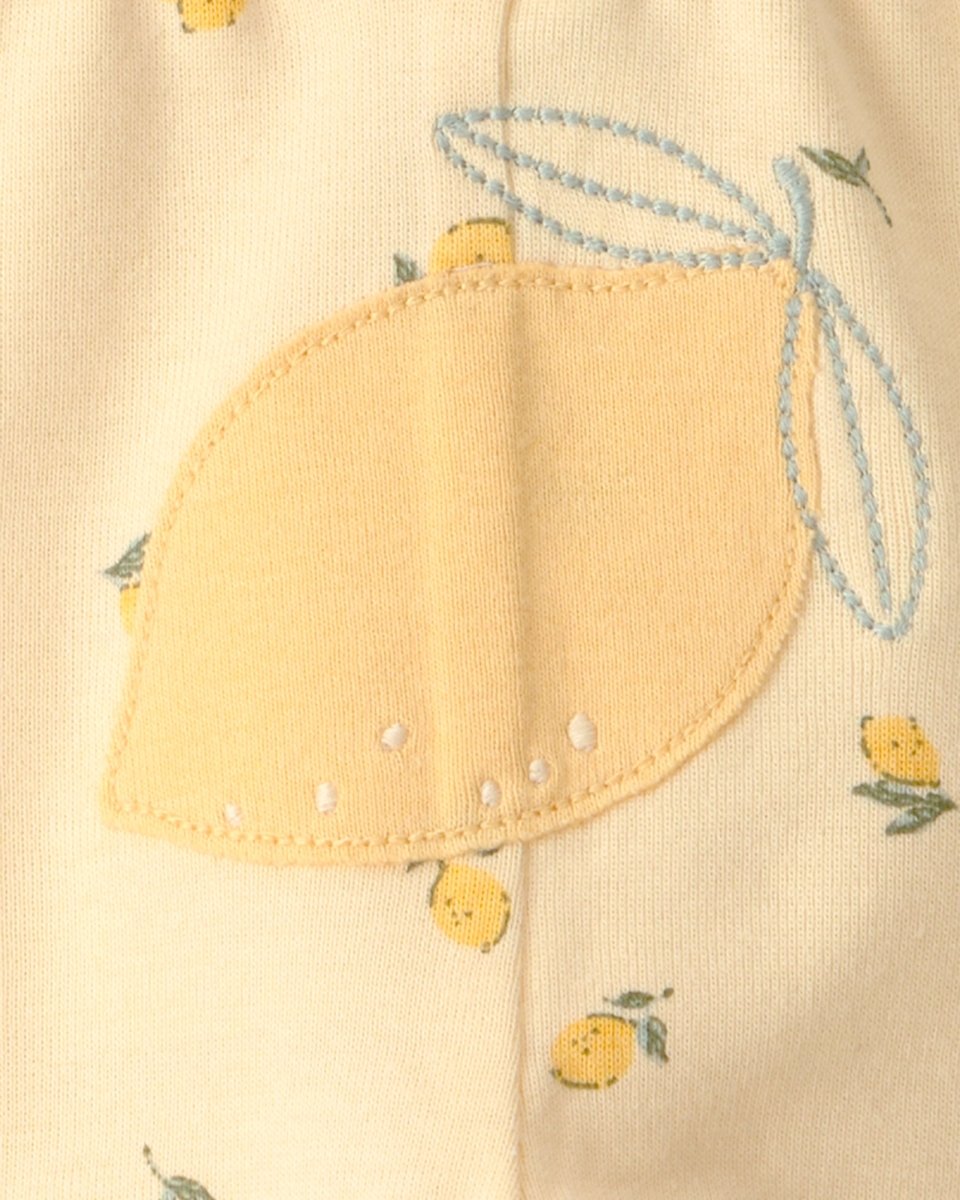 Conjunto tres piezas de algodón con dos bodies y pantalón, diseño limones