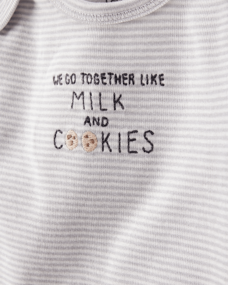 Conjunto tres piezas pantalón y dos bodies diseño galletitas
