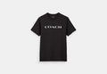COACH® Unisex Camiseta de firma en algodón orgánico en Negro, Talla Mediano