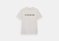 COACH® Unisex Camiseta de firma en algodón orgánico en Blanco, Talla Mediano