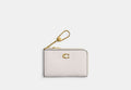 COACH® Women's Llavero Con Cremallera Essential L en Blanco
