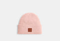 COACH® Unisex Gorro de punto con parche de piel en Latón