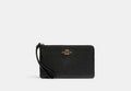 COACH® Women's Bolso Pouch Con Cremallera Grande en Negro | Cuir