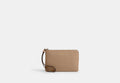 COACH® Women's Bolso Pouch Con Cremallera Corner en Beige | Cuir Fendu