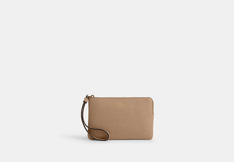 COACH® Women's Bolso Pouch Con Cremallera Corner en Beige | Cuir Fendu