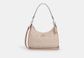 COACH® Women's Bolso de hobo Teri de lona de firma en Beige | Pvc