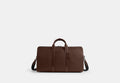 COACH® Men's Bolso duffle Gotham 45 en Castaño | Toile Enduite Signature/pvc