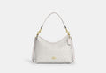 COACH® Women's Bolso de hombro Laurel en lona de firma en Blanco | Pvc