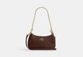COACH® Women's Minibolso cruzado Teri en Castaño | Cuir