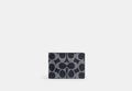 COACH® Men's Cartera Billetera Compacta En Lona De Firma en Azul | Pvc