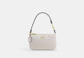 COACH® Women's Nolita 19 de lona de firma en Blanco | Pvc