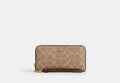 COACH® Women's Cartera Con Cremallera Perimetral Larga De Lona De Firma en Castaño | Pvc
