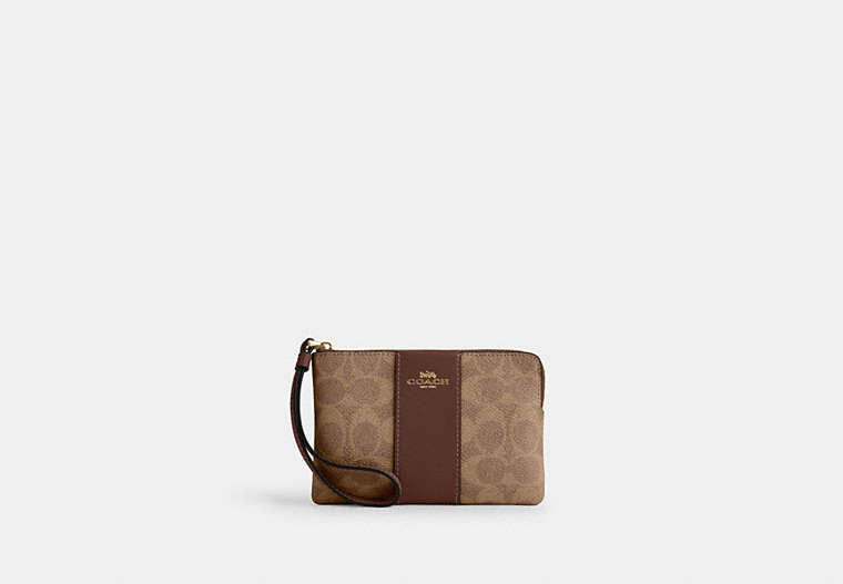COACH® Women's Bolso pouch con cremallera lateral en lona de firma con franja en Castaño | Pvc