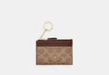 COACH® Women's Miniportadocumentos Skinny en lona de firma en Castaño | Pvc