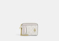 COACH® Women's Tarjetero con cremallera en lona de firma en Blanco | Pvc
