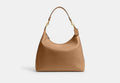 COACH® Women's Bolso de hombro Juliet 38 en Castaño | Cuir