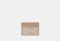 COACH® Women's Tarjetero fino para documento de identidad en lona de firma en Beige | Pvc