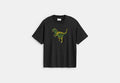 COACH® Unisex Camiseta de corte holgado Rexy de algodón orgánico en Negro, Talla Mediano