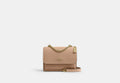 COACH® Women's Minibolso cruzado Klare en Beige | Cuir
