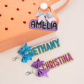 Llavero personalizado con lazo de purpurina para mochila Etiqueta con nombre Accesorios de viaje Uso diario Regalo de cumpleaños para compañeras de equipo Cheerleaders