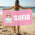 Toalla de playa personalizada con el nombre de un simpático personaje de dibujos animados para las vacaciones de verano de los niños.
