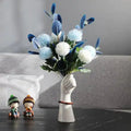 Hand Holding Flower Vase