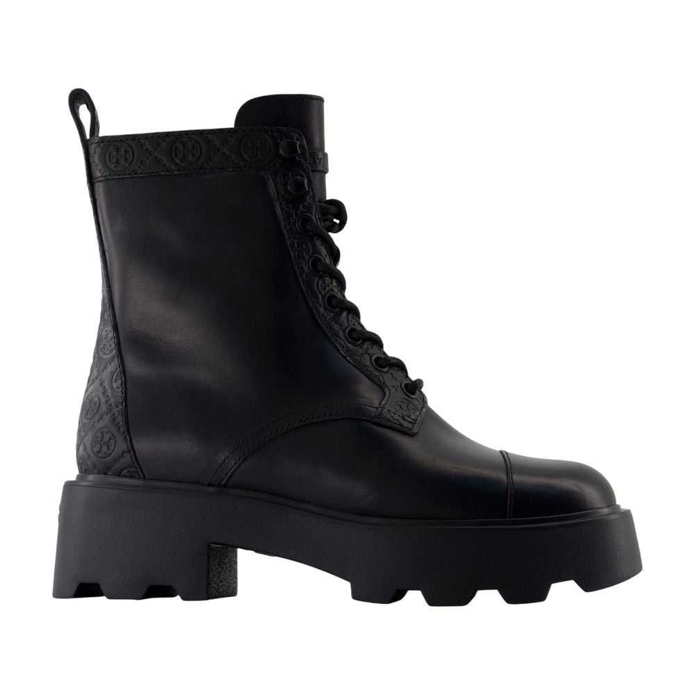 Tory Burch Monogram-embossed Lug Sole Ankle Boot — Black