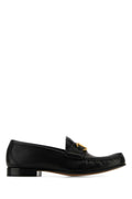 Valentino Garavani Gold-Trimmed Leather Loafer — Black