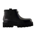 Alexander McQueen Chunky Lug-Sole Leather Ankle Boot — Black