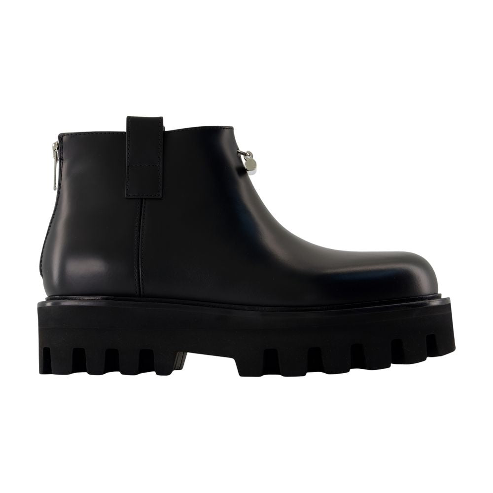 Alexander McQueen Chunky Lug-Sole Leather Ankle Boot — Black